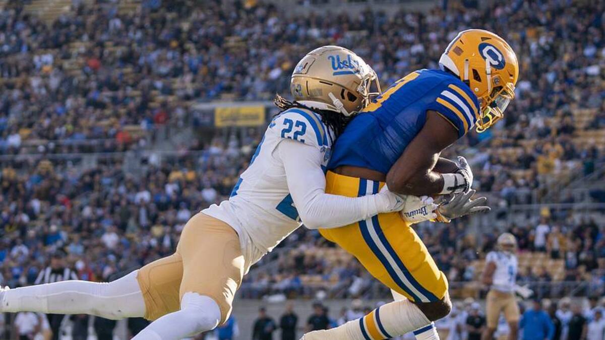  November 25, 2022; Berkeley, California, USA; California Golden Bears wide receiver Jeremiah Hunter (3) catches a touchdown against UCLA Bruins defensive back Azizi Hearn (22) during the second quarter at California Memorial Stadium. Mandatory Credit: Kyle Terada-Imagn Images | Kyle Terada-Imagn Images 