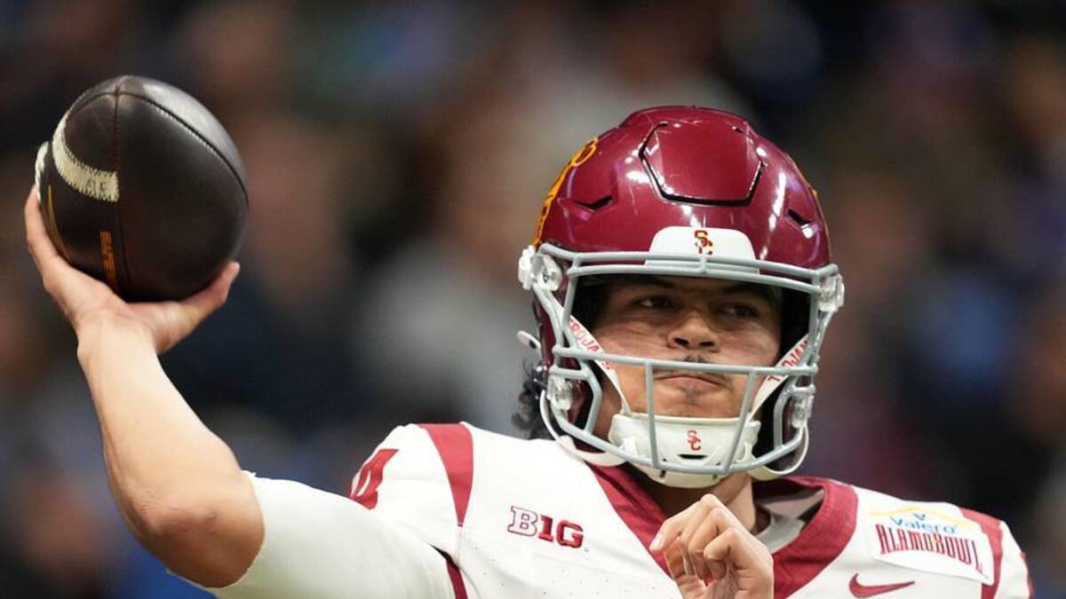  Dec 30, 2025; San Antonio, TX, USA; Southern California Trojans quarterback Jayden Maiava (14) throws the ball against the TCU Horned Frogs in the first half during the Alamo Bowl at Alamodome. Mandatory Credit: Kirby Lee-Imagn Images | Kirby Lee-Imagn Images 
