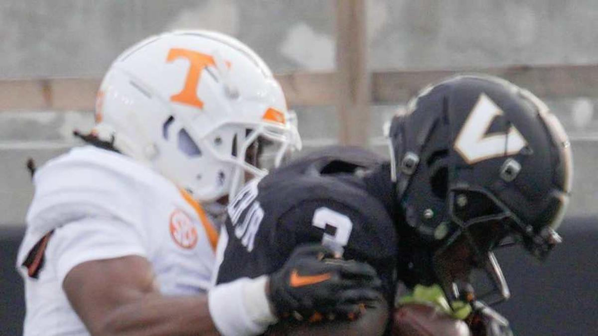  Tennessee defensive back Jermod McCoy (3) takes down Vanderbilt wide receiver Quincy Skinner Jr. (3) during the third quarter at FirstBank Stadium in Nashville, Tenn., Saturday, Nov. 30, 2024. | Stephanie Amador / The Tennessean / USA TODAY NETWORK via Imagn Images 