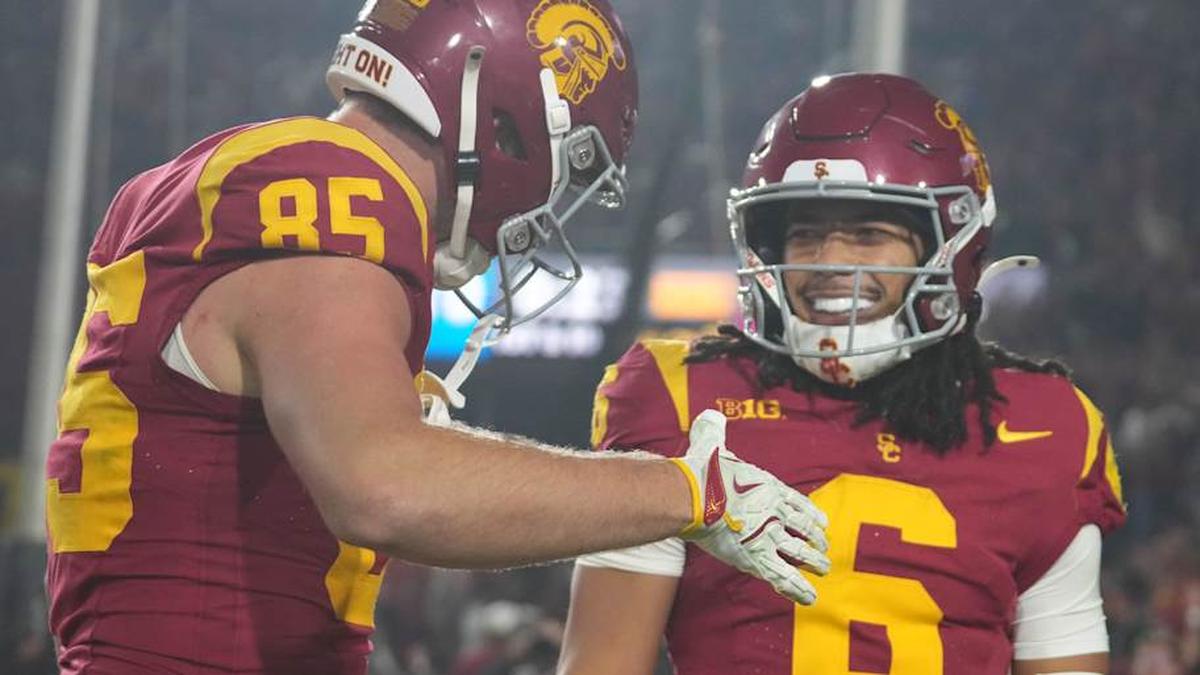  Nov 29, 2025; Los Angeles, California, USA; Southern California Trojans wide receiver Makai Lemon (6) celebrates with tight end Walker Lyons (85) after catching a 32-yard touchdown pass against the UCLA Bruins in the second half at United Airlines Field at Los Angeles Memorial Coliseum. Mandatory Credit: Kirby Lee-Imagn Images | Kirby Lee-Imagn Images 