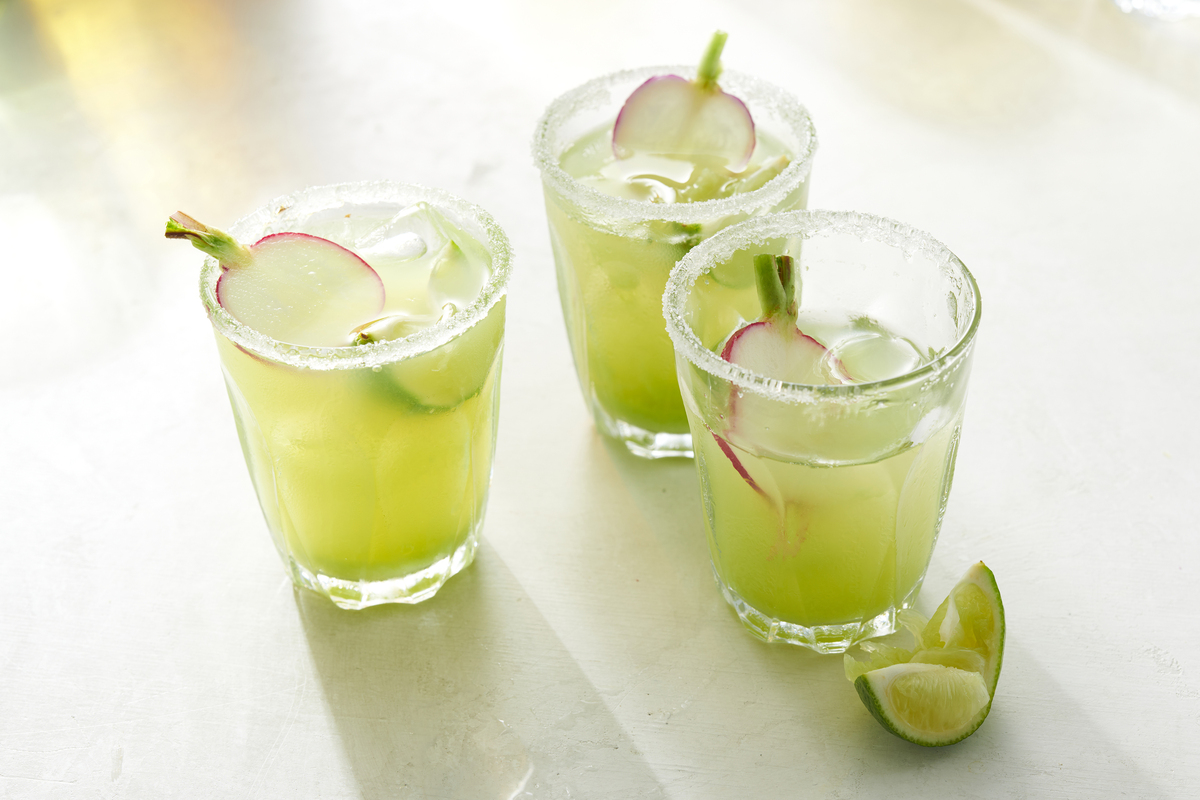 Cucumber-apple cooler. Though this refreshing cucumber concoction may be served as a cold soup in a bowl, it's best served in a chilled glass as a drink. Food styled by Cyd Raftus McDowell. (David Malosh/The New York Times)