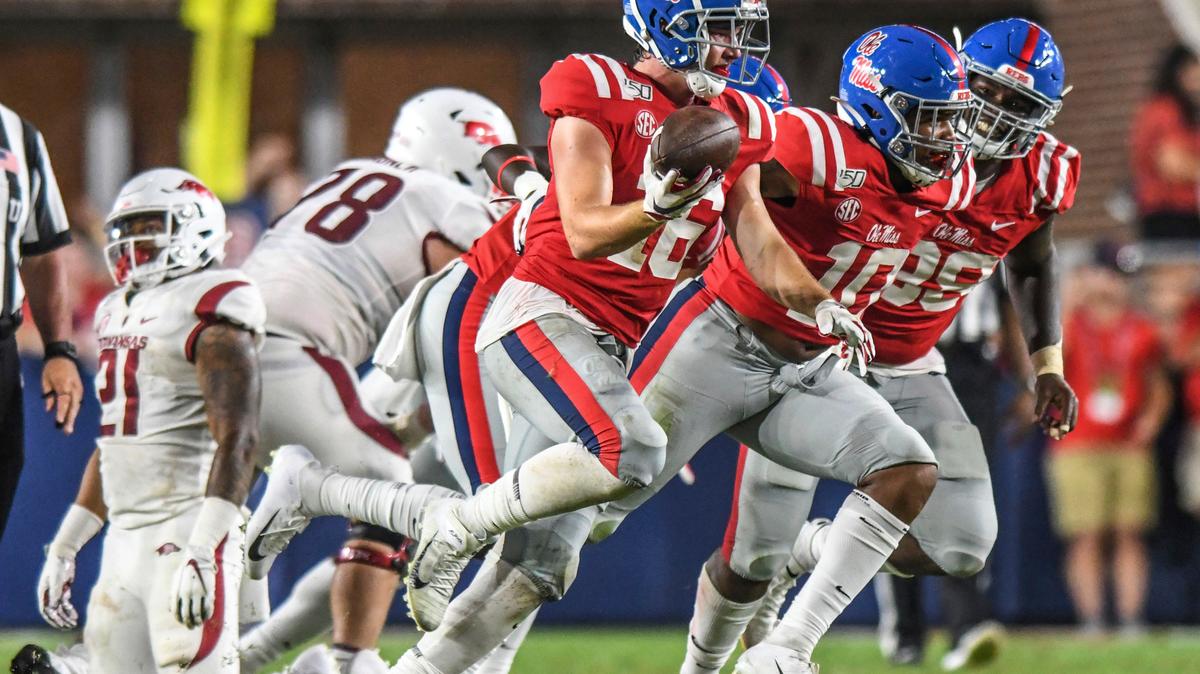 FILE -Mississippi linebacker Luke Knox (16) celebrates a fumble recovery against Arkansas during an NCAA college football game Saturday, Sept. 7, 2019, in Oxford, Miss. Knox, who appeared in 23 games at Ole Miss before joining the Panthers, has died, the university said. Knox died Wednesday, Aug. 17, 2022, school officials said. The cause was not revealed, though the university said early Thursday that police “do not suspect foul play.”(Bruce Newman/The Oxford Eagle via AP)