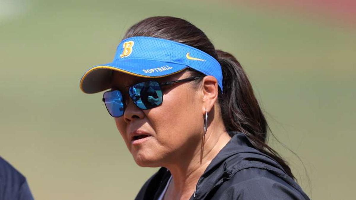  UCLA coach Kelly Inouye-Perez talks with an official during a Women's College World Series softball game between the University of Oklahoma Sooners (OU) and the UCLA Bruins at Devon Park in Oklahoma City, Saturday, June 1, 2024. Oklahoma won 1-0. | BRYAN TERRY/THE OKLAHOMAN / USA TODAY NETWORK 