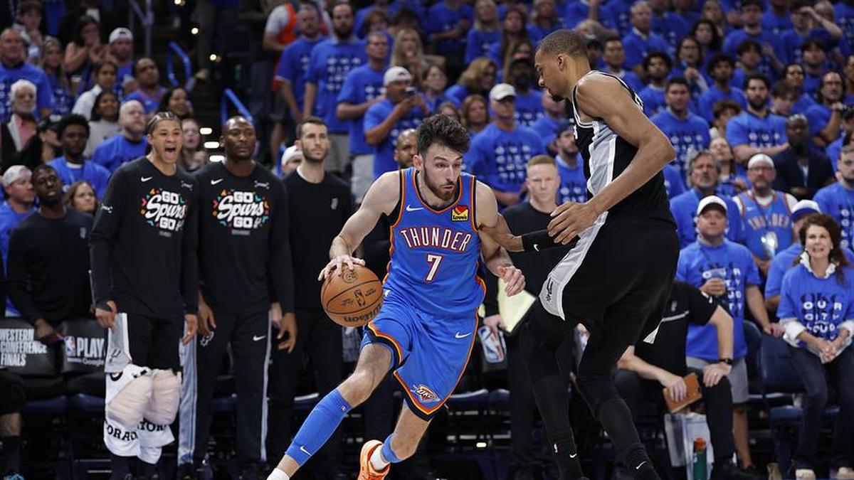  Thunder center Chet Holmgren drives against Spurs forward Victor Wembanyama in the fourth quarter of Game 7. | Alonzo Adams-Imagn Images 