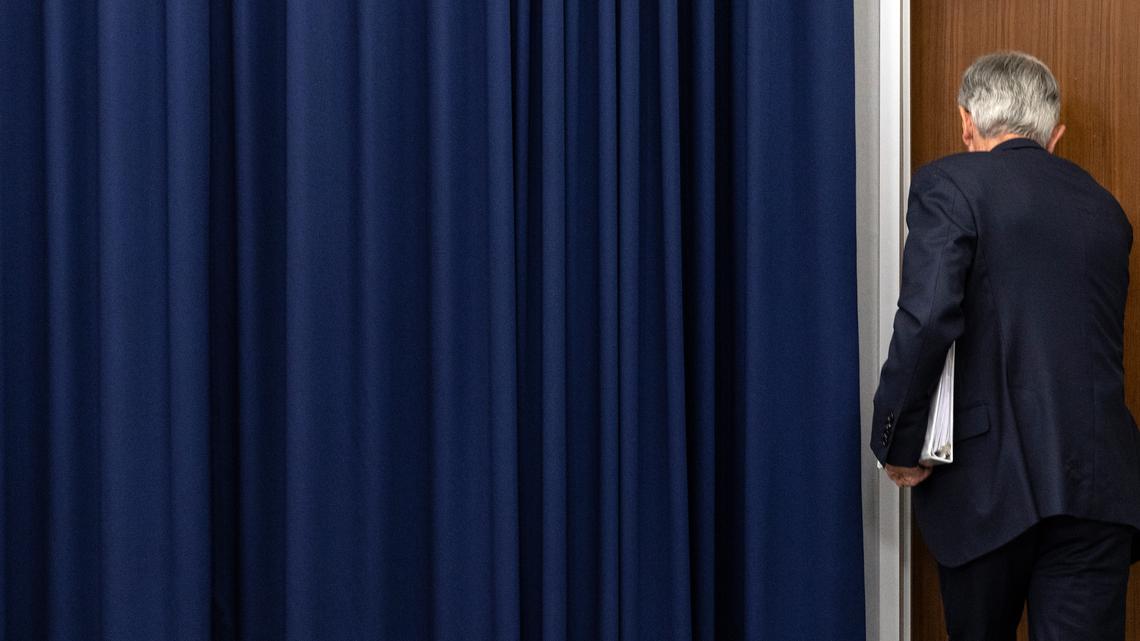 Behind Powell's high-stakes decision to stay at the Fed