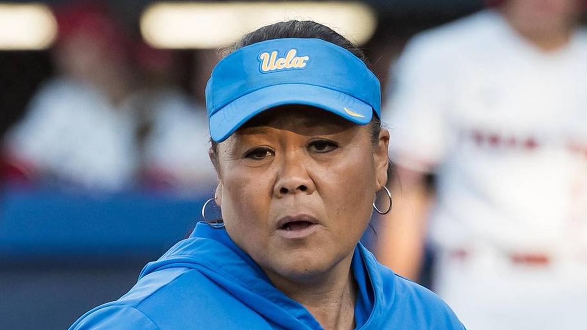  May 31, 2025; Oklahoma City, OK, USA; UCLA Bruins head coach Kelly Inouye-Perez walks back to the dugout in the sixth inning against the Texas Tech Red Raiders during the NCAA Softball Women's College World Series at Devon Park. Mandatory Credit: Brett Rojo-Imagn Images | Brett Rojo-Imagn Images 