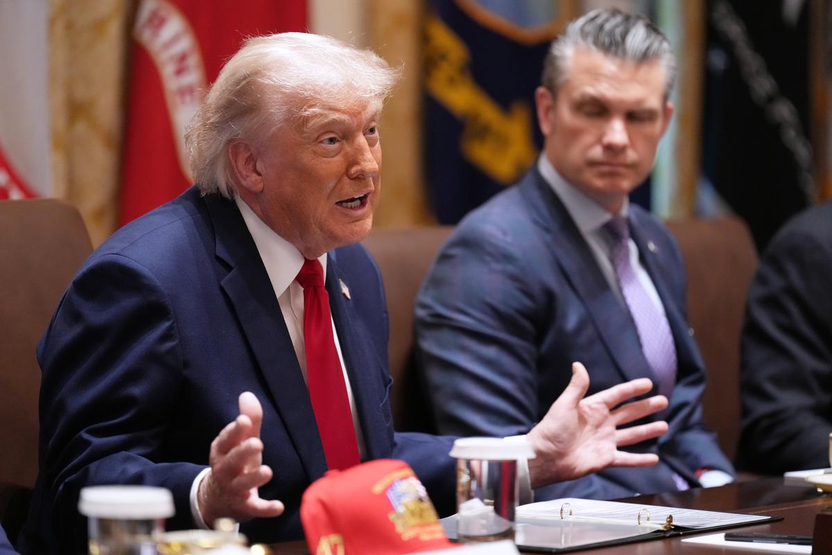  President Donald Trump (L) and Defense Secretary Pete Hegseth at a Cabinet meeting at the White House on May 27, 2026. 