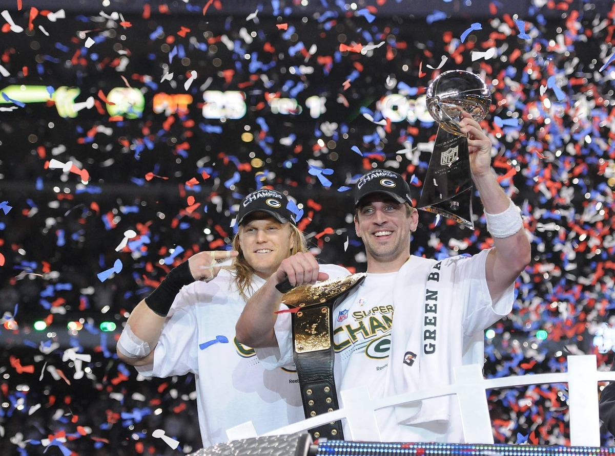  Green Bay Packers linebacker Clay Matthews points to Super Bowl MVP Aaron Rodgers after giving him a championship belt following Super Bowl XLV at Cowboys Stadium. USA TODAY NETWORK-Wis. via Imagn Content Services, LLC