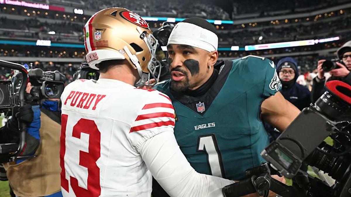  Jan 11, 2026; Philadelphia, PA, USA; San Francisco 49ers quarterback Brock Purdy (13) and Philadelphia Eagles quarterback Jalen Hurts (1) meet on the field in an NFC Wild Card Round game at Lincoln Financial Field. Mandatory Credit: Eric Hartline-Imagn Images | Eric Hartline-Imagn Images 