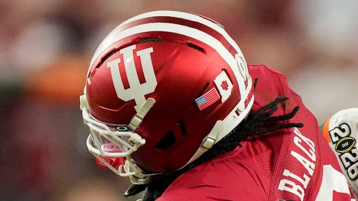  Miami (FL) Hurricanes defensive back Keionte Scott (0) tackles Indiana Hoosiers running back Kaelon Black (8) on Monday, Jan. 19, 2026, during the College Football Playoff National Championship college football game at Hard Rock Stadium in Miami Gardens. | Grace Hollars/IndyStar / USA TODAY NETWORK via Imagn Images 