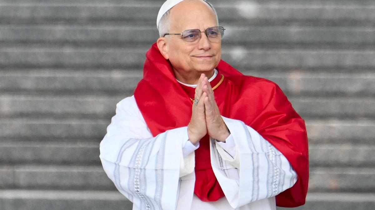 Pope Leo XIV gestures during a visit at the Maqam Echahid Martyrs' Monument in El Madania, near Algiers, on April 13, 2026.