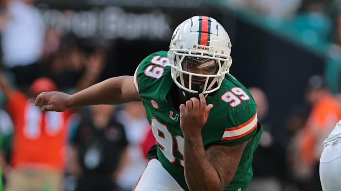  Nov 23, 2024; Miami Gardens, Florida, USA; Miami Hurricanes defensive lineman Ahmad Moten Sr. (99) reacts after sacking Wake Forest Demon Deacons quarterback Hank Bachmeier (not pictured) during the third quarter at Hard Rock Stadium. Mandatory Credit: Sam Navarro-Imagn Images | Sam Navarro-Imagn Images 