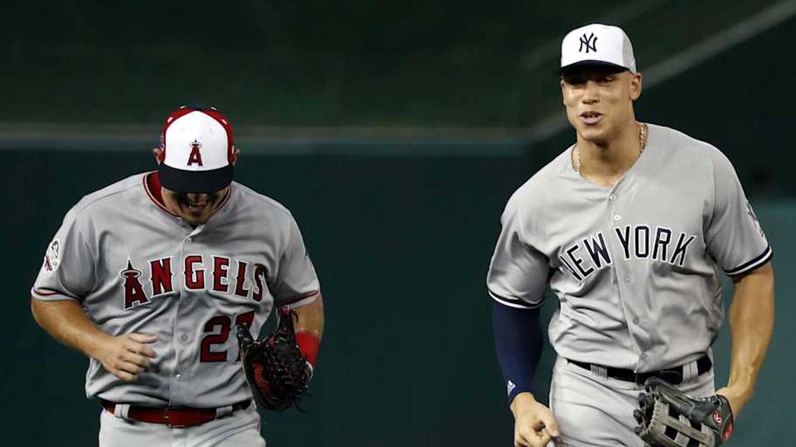  Jul 17, 2018; Washington, DC, USA; American League outfielder Aaron Judge of the New York Yankees (99) and American League outfielder Mike Trout of the Los Angeles Angels (27) run to the dug out after the first inning in the 2018 MLB All Star Game at Nationals Ballpark. Mandatory Credit: Geoff Burke-Imagn Images | Geoff Burke-Imagn Images 