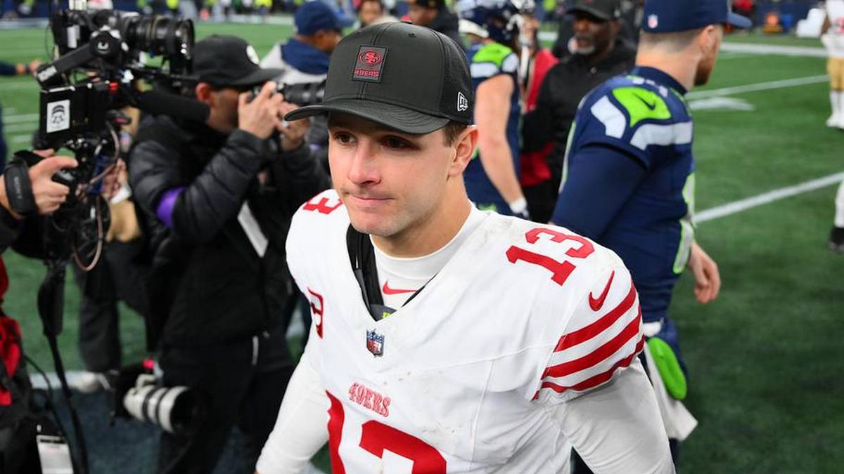  Jan 17, 2026; Seattle, WA, USA; San Francisco 49ers quarterback Brock Purdy (13) leaves the field following an NFC Divisional Round game against the Seattle Seahawks at Lumen Field. Mandatory Credit: Steven Bisig-Imagn Images | Steven Bisig-Imagn Images 
