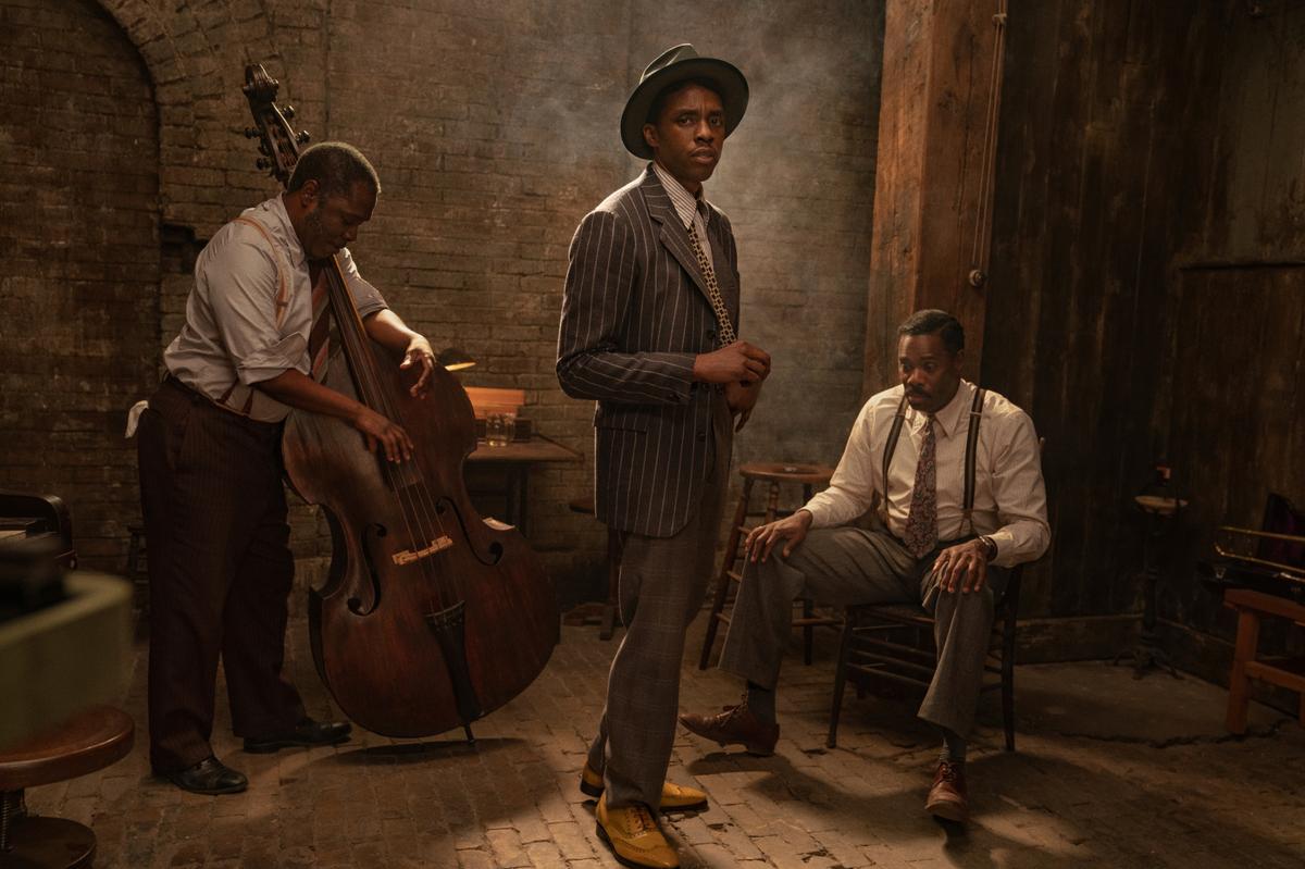 The late Chadwick Boseman, center, is a shoo-in to win the Golden Globe for best actor in a movie drama for “Ma Rainey’s Black Bottom.” Michael Potts, left, and Colman Domingo co-star.