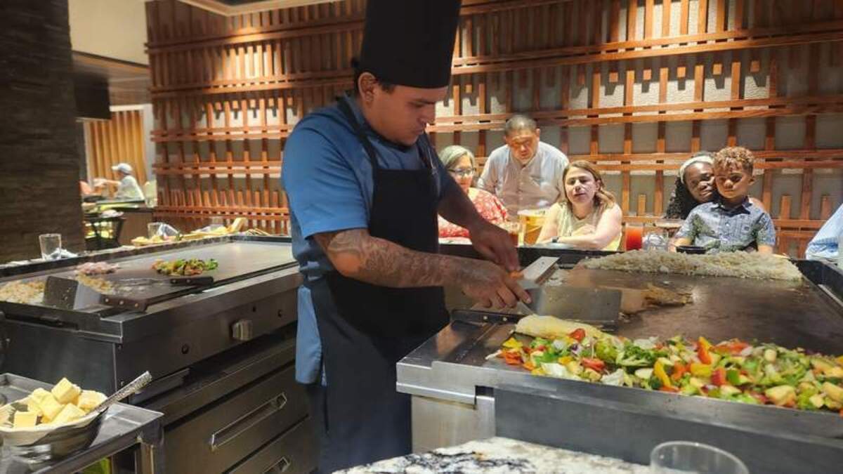  The chef at Mikado prepares food on two different grills, accommodating my son’s multiple food allergies and allowing him to experience his very first Hibachi experience. Photo credit: Kimberly Miles 