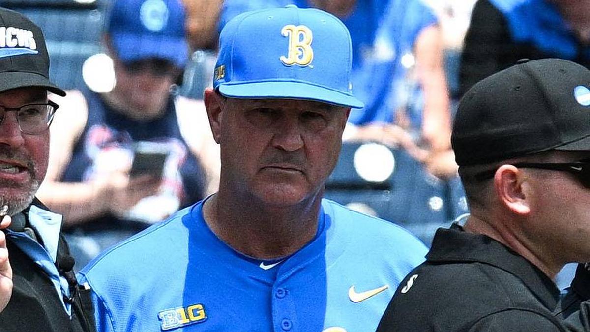  Jun 14, 2025; Omaha, Neb, USA; Murray State Racers head coach Dan Skirka and UCLA Bruins head coach John Savage meet with umpires before the game at Charles Schwab Field. Mandatory Credit: Steven Branscombe-Imagn Images | Steven Branscombe-Imagn Images 