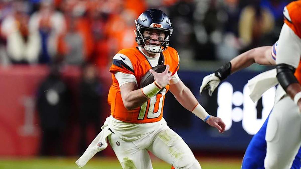  Jan 17, 2026; Denver, CO, USA; Denver Broncos quarterback Bo Nix (10) runs during the fourth quarter of an AFC Divisional Round playoff game against the Buffalo Bills at Empower Field at Mile High. Mandatory Credit: Ron Chenoy-Imagn Images | Ron Chenoy-Imagn Images 