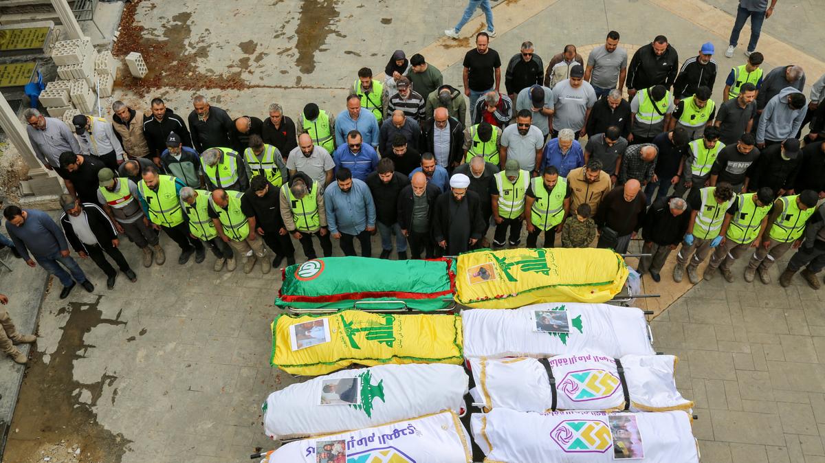 Mourners attend the funeral of people killed on Tuesday in an Israeli strike, in Deir Qanoun al-Nahr, southern Lebanon, May 21, 2026. REUTERS/Stringer