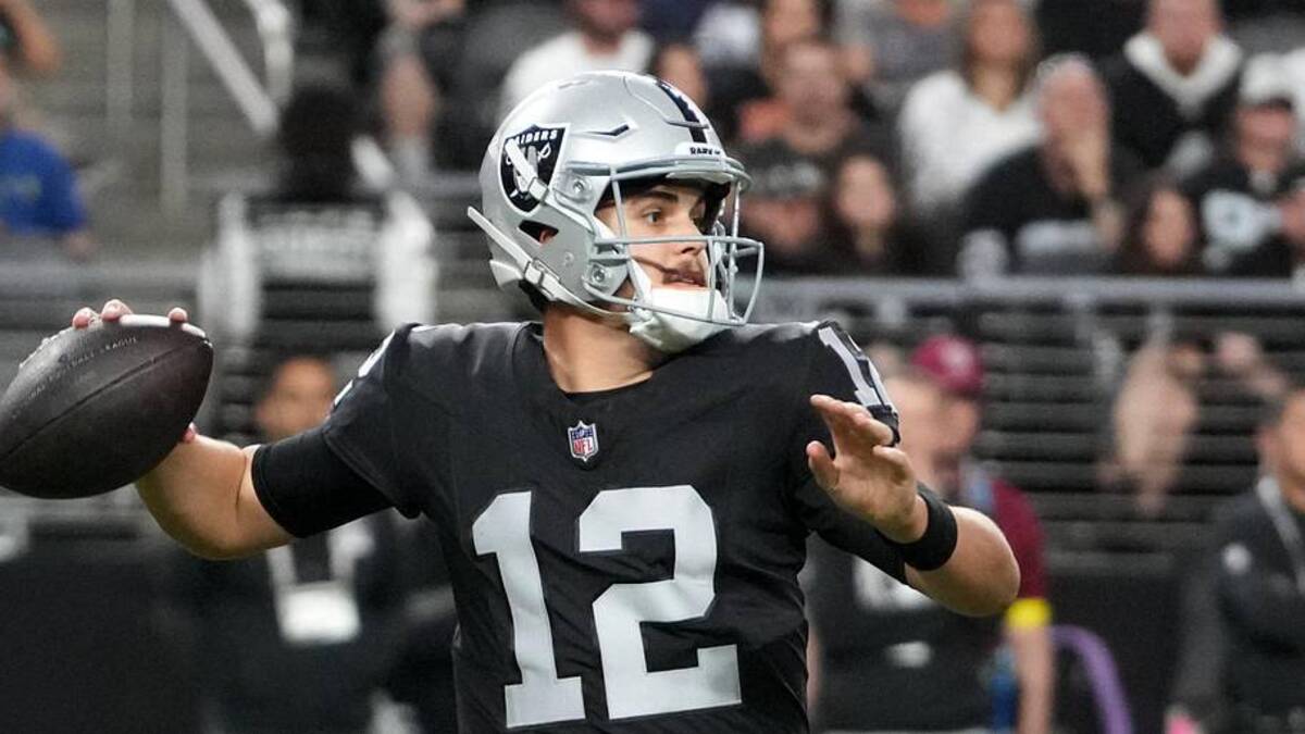 Jan 4, 2026; Paradise, Nevada, USA; Las Vegas Raiders quarterback Aidan O'Connell (12) throws the ball against the Kansas City Chiefs in the second half at Allegiant Stadium. Mandatory Credit: Kirby Lee-Imagn Images | Kirby Lee-Imagn Images 
