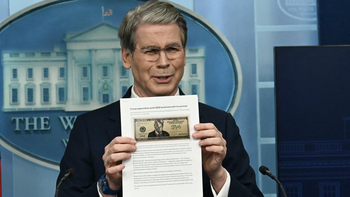 U.S. Secretary of Treasury Scott Bessent shows a proposed $250 bill featuring President Donald Trump during a news briefing in the Brady Briefing Room of the White House in Washington, D.C., on Thursday, May 28, 2026. (Kent Nishimura/AFP/Getty Images/TNS)