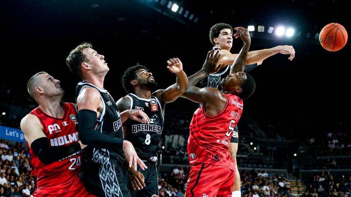  With his solid 6'9" frame and nearly 7-foot wingspan, Karim López can contest shots and disrupt opposing offenses. | Hannah Peters/Getty Images 