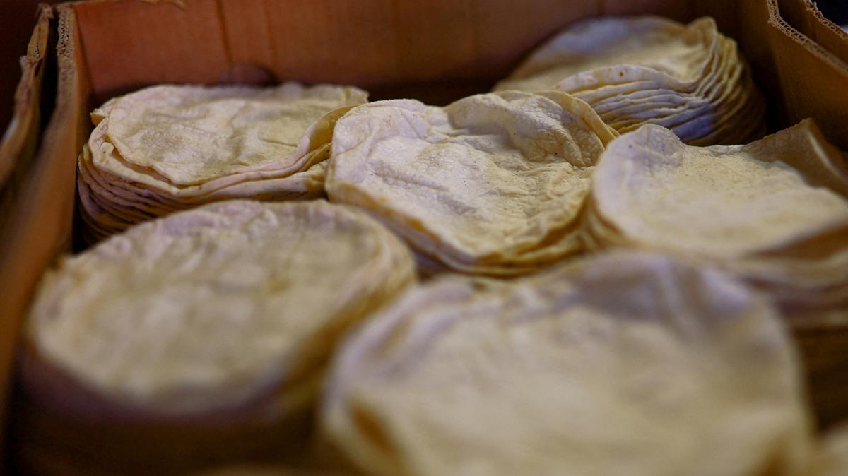 FILE PHOTO: Tortillas in a box at a tortilla business following March's inflation surge driven by rising food and energy prices, in Ciudad Juarez, Mexico, April 15, 2026. REUTERS/Jose Luis Gonzalez/File Photo