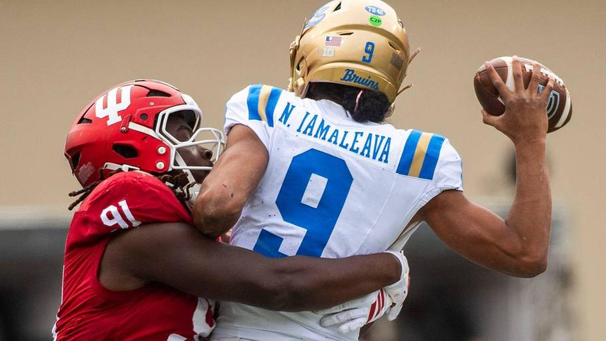  Indiana's Dominique Ratcliff (91) pressures UCLA's Nico Iamaleava (9) during the Indiana versus UCLA football game at Memorial Stadium on Saturday, Oct. 25, 2025. | Rich Janzaruk/Herald-Times / USA TODAY NETWORK via Imagn Images 