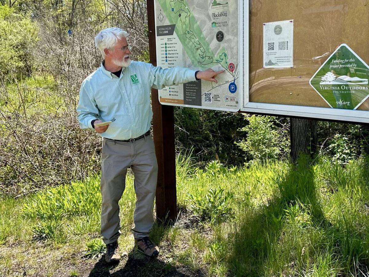  Blacksburg’s Parks and Rec Director, Dean Crane, points out trail highlights. Photo credit: Cathy Bennett Kopf 