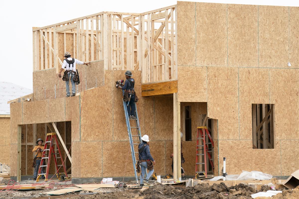 FILE -- Construction workers build a home at a new housing development in Hardeeville, S.C., March 31, 2026. The House passed a sprawling housing bill on Wednesday, May 20, 2026, aimed at tackling a major cost-of-living issue, bringing Congress a step closer to passing the most substantial housing legislation in a generation. (Sean Rayford/The New York Times)