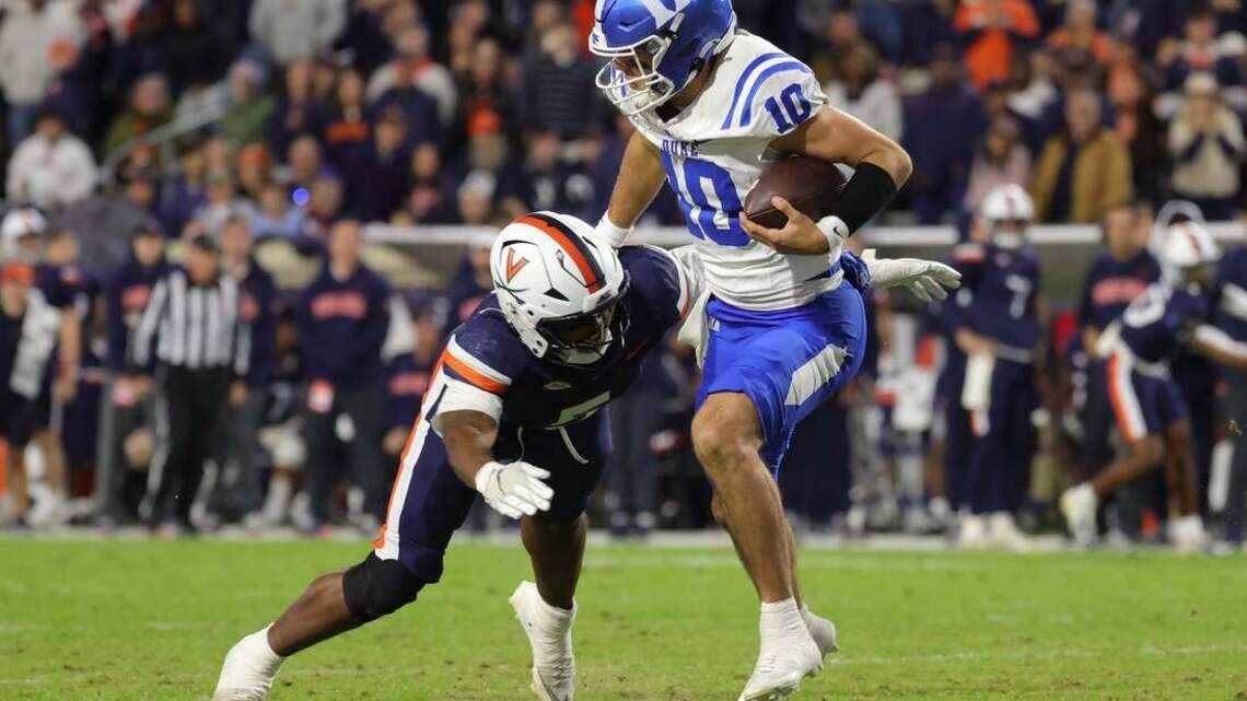 Duke uses RB Nate Sheppard's TD pass to slip past Virginia