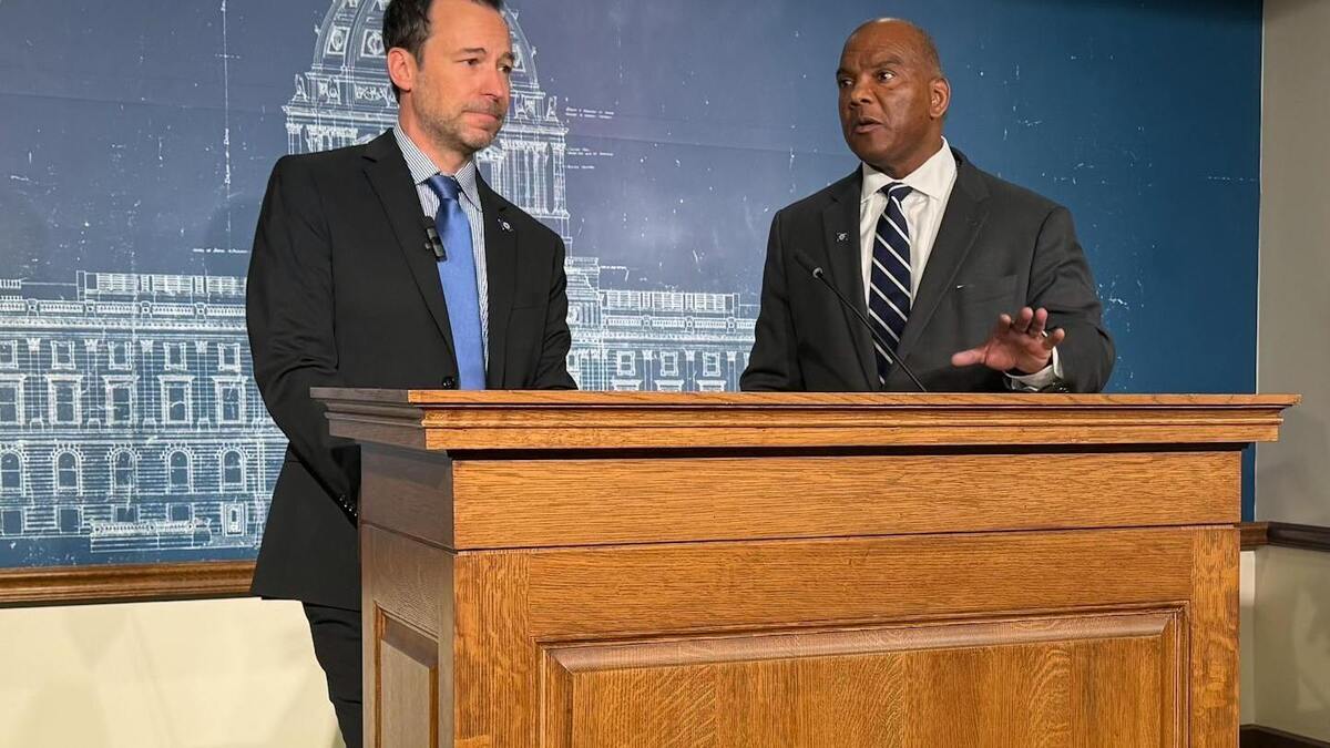 Kendall Qualls, right, a Republican candidate for governor, introduces his running mate Brian Nicholson at a news conference at the State Capitol on March 3. (Ryan Faircloth/The Minnesota Star Tribune/TNS)