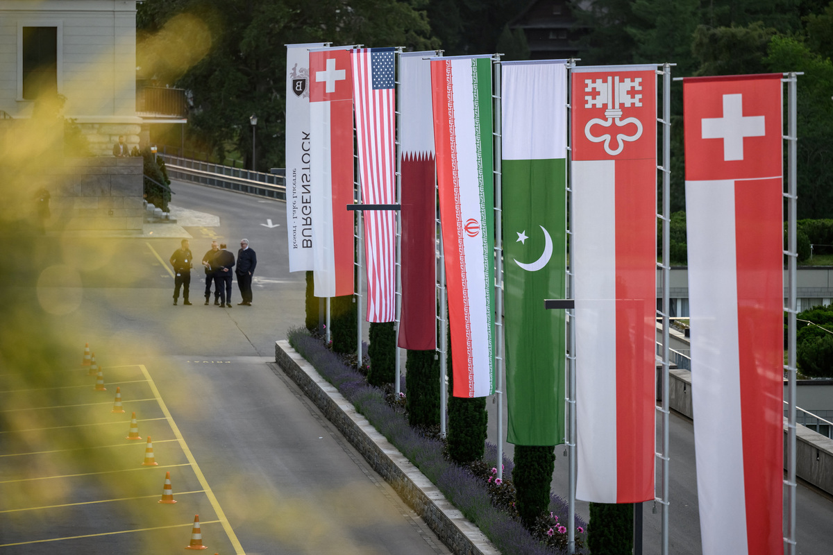 Flags of Switzerland, the United States, Qatar, Pakistan and the local Swiss canton of Nidwalden are photographed at the Burgenstock luxury hotel complex overlooking Lake Lucerne, Switzerland, on June 21, 2026, ahead of high-level talks aimed at advancing a deal to end the Middle East conflict.  Fabrice Coffrini/Pool via REUTERS
