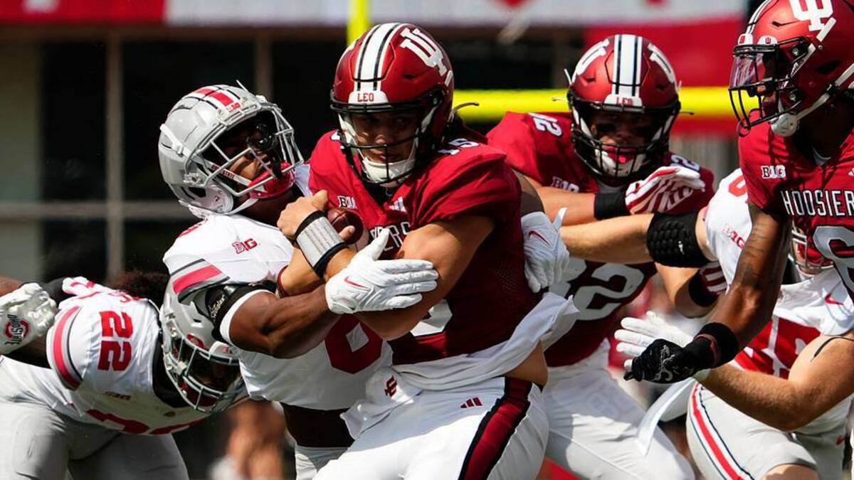  Sep 2, 2023; Bloomington, Indiana, USA; Ohio State Buckeyes safety Sonny Styles (6) tackles Indiana Hoosiers quarterback Brendan Sorsby (15) during the first half of the NCAA football game at Indiana University Memorial Stadium. | Adam Cairns/Columbus Dispatch / USA TODAY NETWORK via Imagn Images 