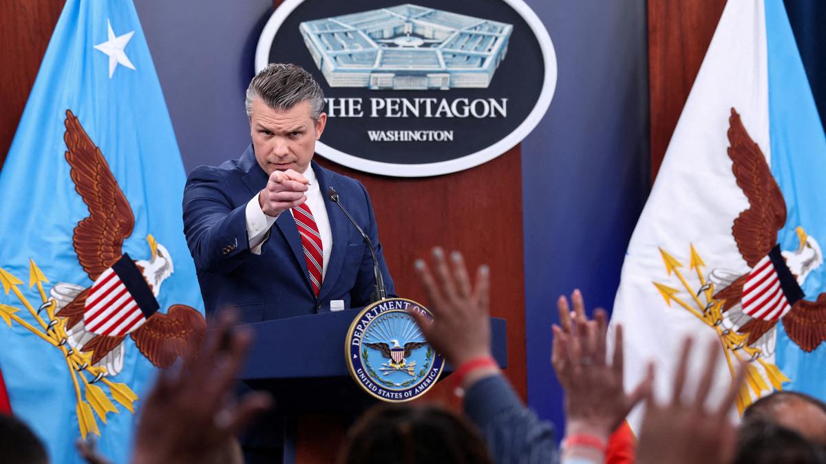 U.S. Secretary of Defense Pete Hegseth holds a briefing on the Iran war, with Chairman of the Joint Chiefs of Staff General Dan Caine (not pictured), at the Pentagon in Washington, D.C., U.S., May 5, 2026. REUTERS/Kevin Lamarque
