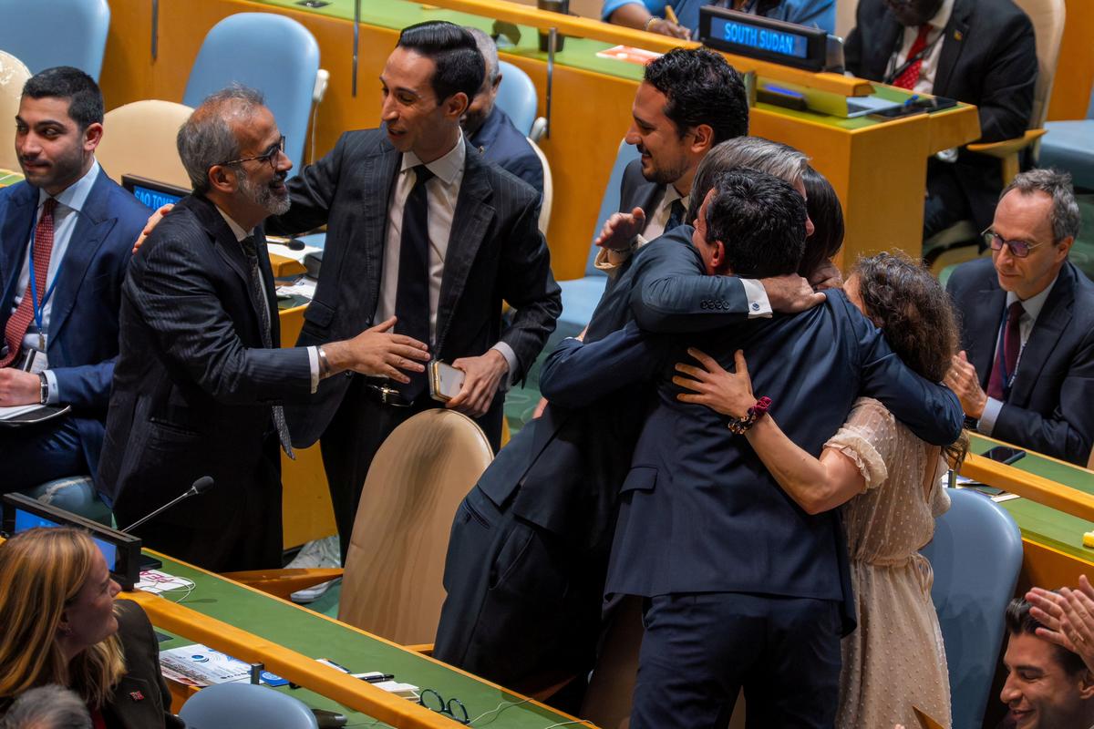 The Portuguese delegation celebrates after winning the election of non-permanent members of the United Nations Security Council at U.N. headquarters in New York City, U.S., June 3, 2026. REUTERS/David 'Dee' Delgado