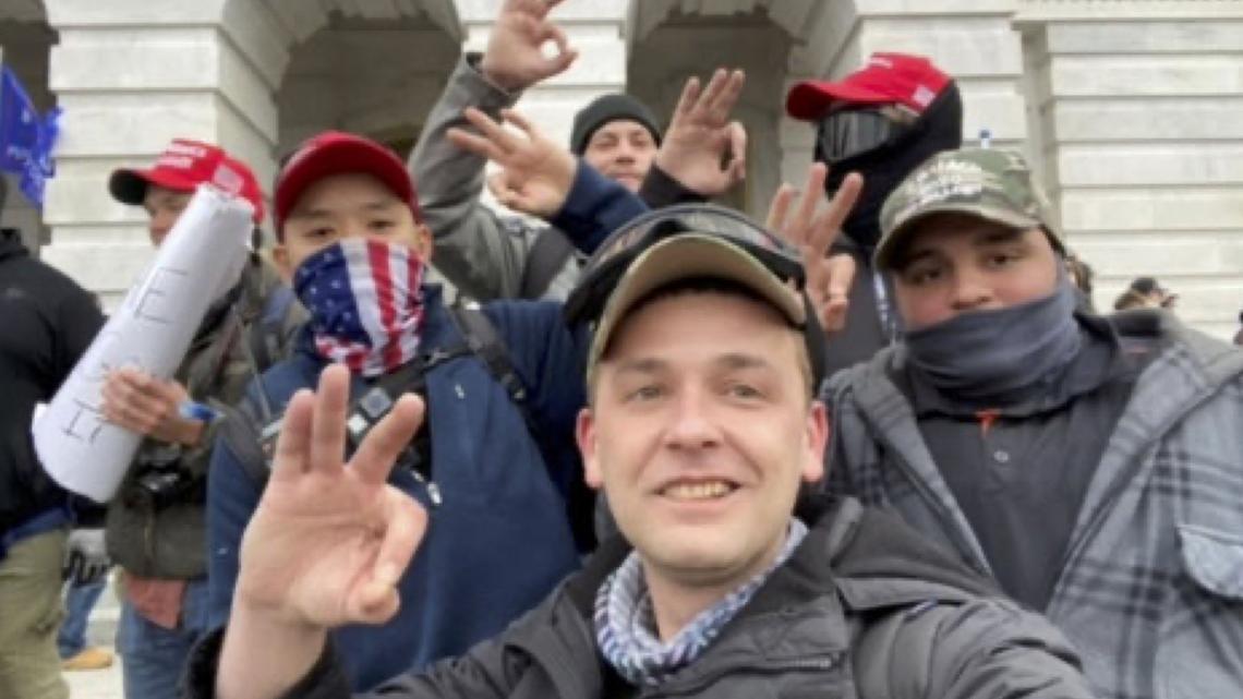 Zach Rehl, front, snaps a selfie with Freedom Vy, left, Isaiah Giddings, right, and Brian Healion, back right, according to investigators. (U.S. Department of Justice Department/TNS)