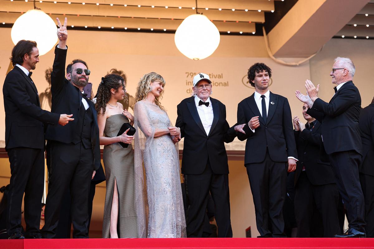 Bruce Dern, Laura Dern and guests pose on the red carpet during arrivals for the screening of the film "La Bataille de Gaulle: L'Age de fer" (De Gaulle: Tilting Iron) Out of competition at the 79th Cannes Film Festival in Cannes, France, May 20, 2026. REUTERS/Gonzalo Fuentes