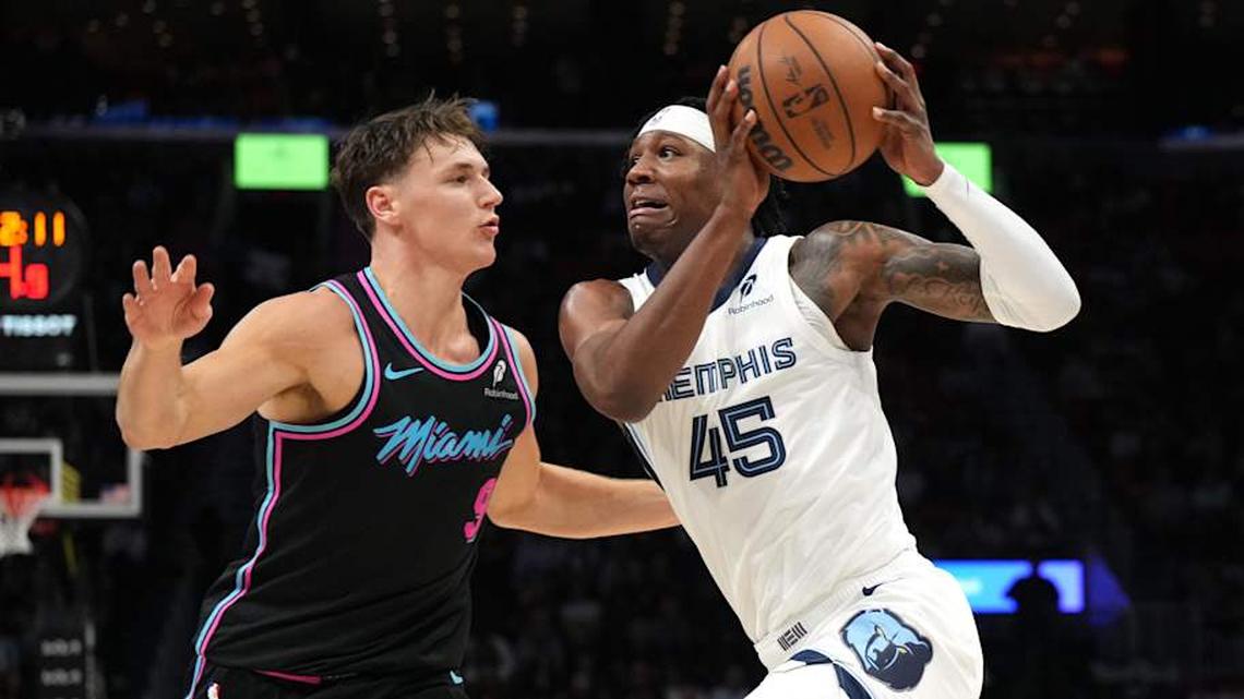  Feb 21, 2026; Miami, Florida, USA; Memphis Grizzlies forward GG Jackson (45) drives to the basket as Miami Heat guard Pelle Larsson (9) defends during the first half at Kaseya Center. Mandatory Credit: Jim Rassol-Imagn Images | Jim Rassol-Imagn Images 
