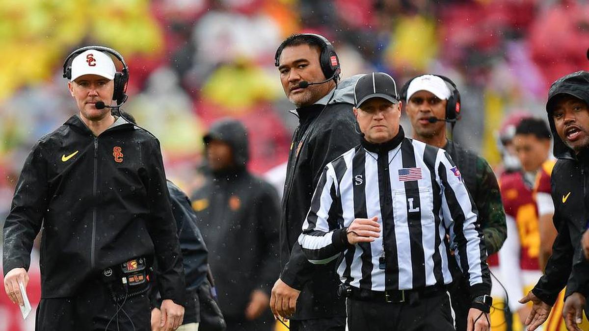  Nov 15, 2025; Los Angeles, California, USA; Southern California Trojans head coach Lincoln Riley watches game action against the Iowa Hawkeyes during the first half at the Los Angeles Memorial Coliseum. Mandatory Credit: Gary A. Vasquez-Imagn Images | Gary A. Vasquez-Imagn Images 