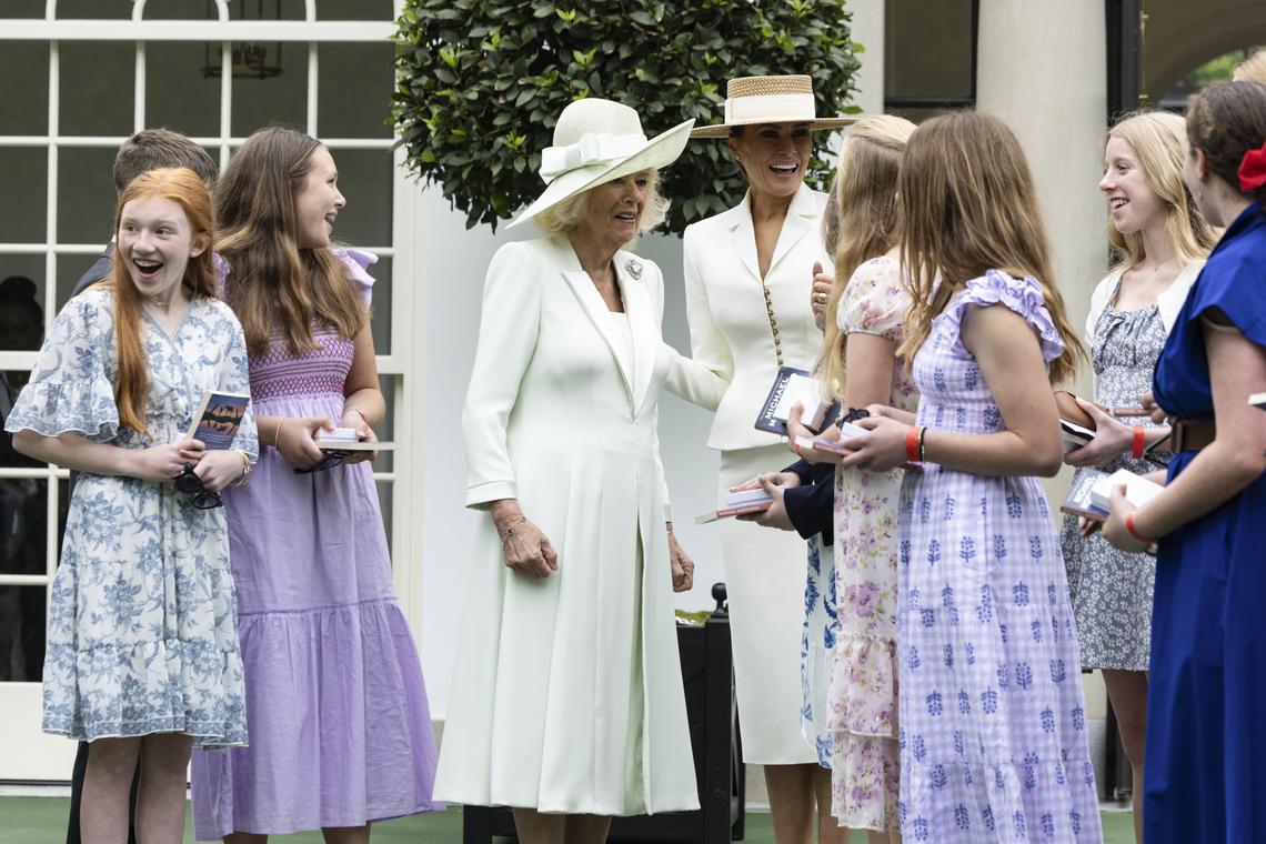 Fist lady Melania Trump, right, and Queen Camilla speak to students during an event on "exploring U.S.-U.K. History through Innovation" at the White House Tennis Pavilion at the White House campus in Washington, on Tuesday, April 28, 2026. (Anna Rose Layden/The New York Times)