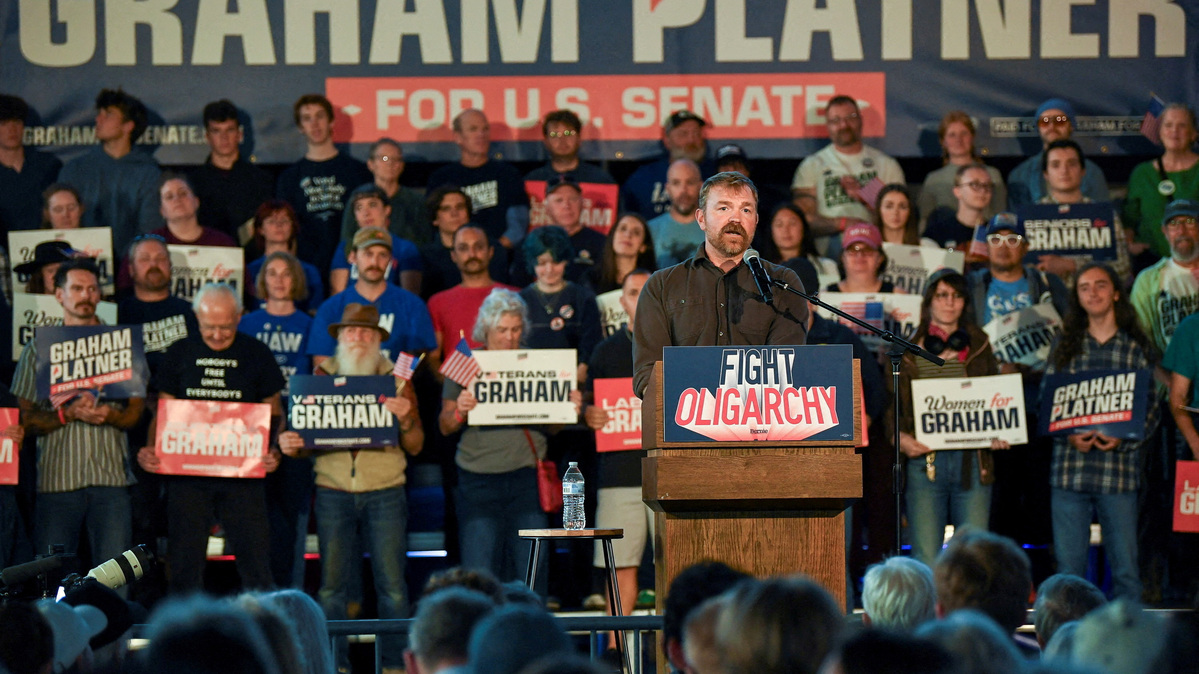 FILE PHOTO: Graham Platner, Democratic candidate for U.S. Senate in Maine, speaks during a "Fighting Oligarchy" campaign rally with U.S. Senator Bernie Sanders (I-VT) in Portland, Maine, U.S., May 25, 2026.   REUTERS/Amanda Sabga/File Photo