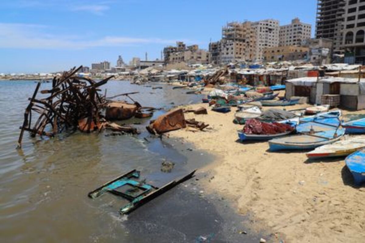 Skiffs used by Palestinian fishermen are docked on the beach in Gaza City, June 3, 2026. REUTERS/Ebrahim Hajjaj