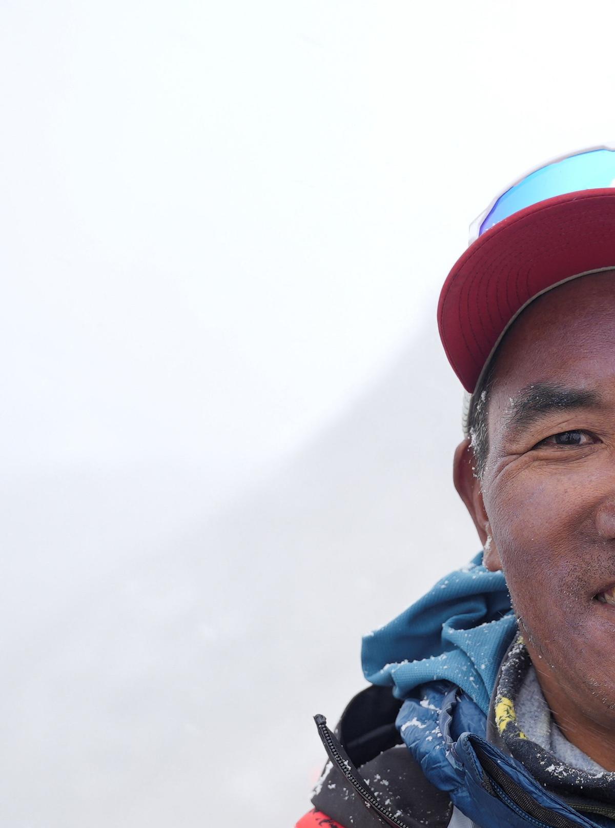 Kami Rita Sherpa, 55, a Nepali mountaineer who has climbed Mount Everest 31 times and holds the record for the most summits of the world's highest mountain, smiles as he poses for a picture at Everest Base Camp as he prepares to climb Everest for the 32nd time to break his own record, in the Solukhumbu district, also known as the Everest region, Nepal, April 29, 2026. REUTERS/Purnima Shrestha