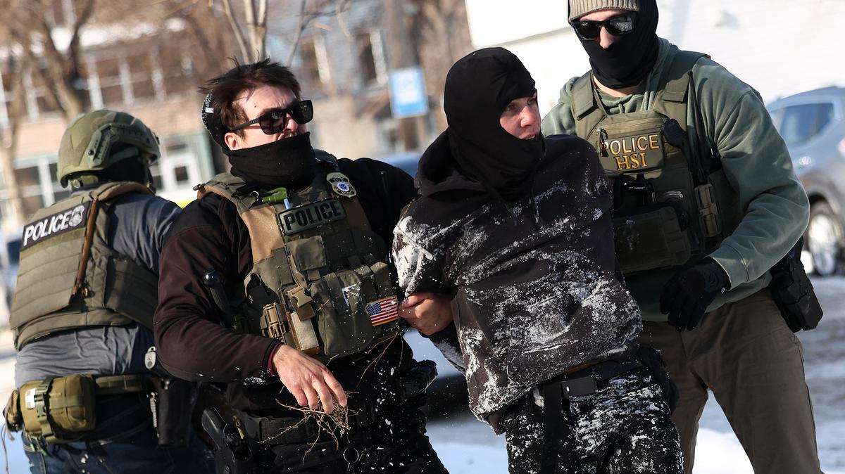 Federal agents detain a protester in Minneapolis, Minnesota on Feb. 3.