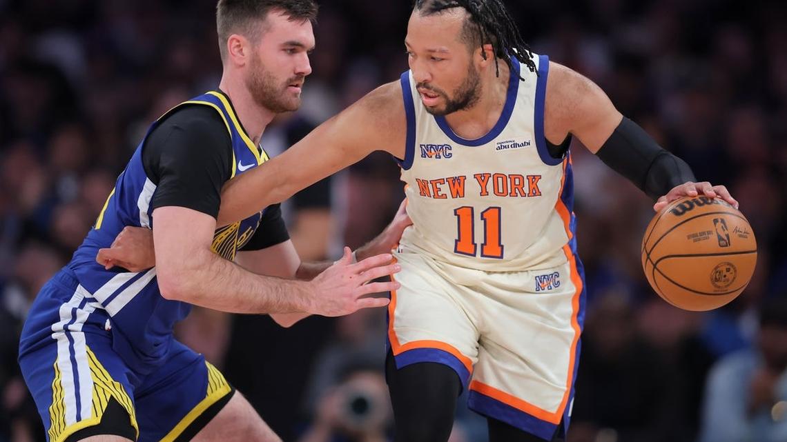 Knicks recover from 21-point deficit, hold off Warriors 