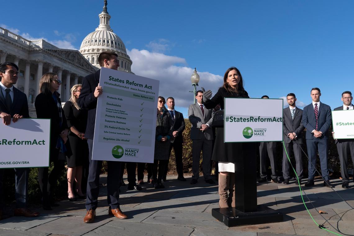Rep. Nancy Mace, R-S.C., center, speaks during a news conference about a cannabis reform bill she introduced, Monday, Nov. 15, 2021, on Capitol Hill in Washington. (AP Photo/Jacquelyn Martin)