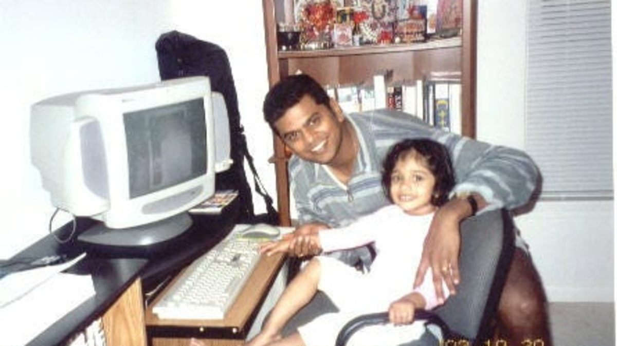 A 2002 picture with Trisha Prabhu, 2, and her father, Neel.