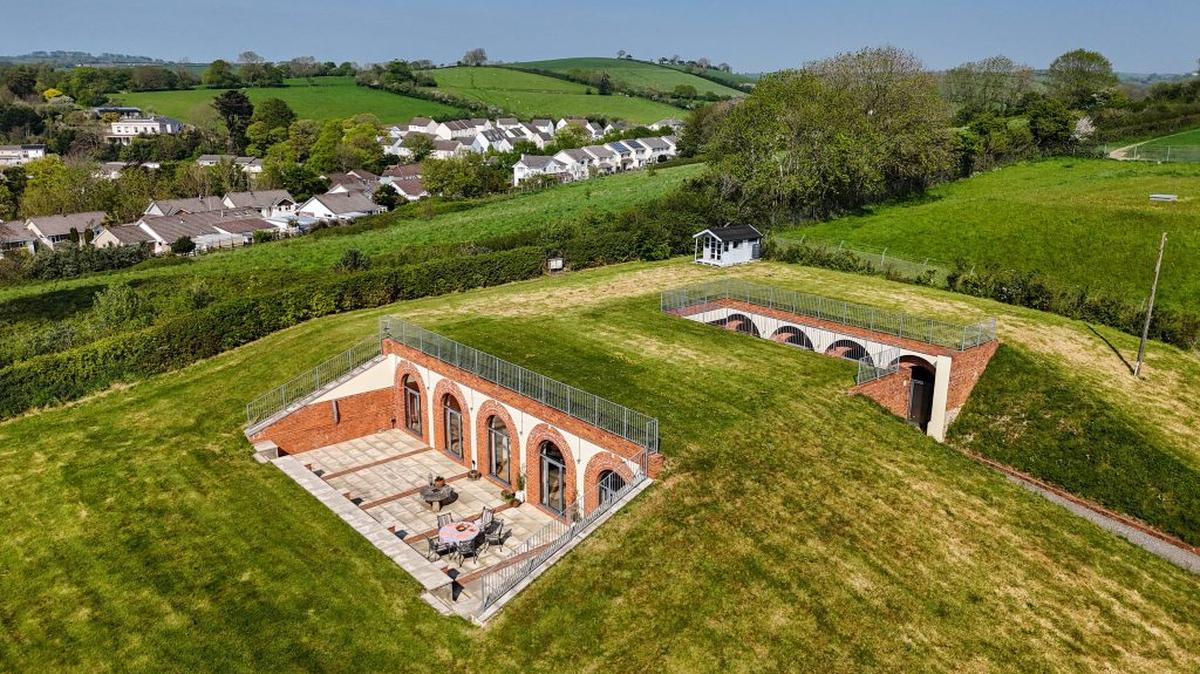 The four-bed home that is a converted subterranean water reservoir. (Jackson-Stops via SWNS). 