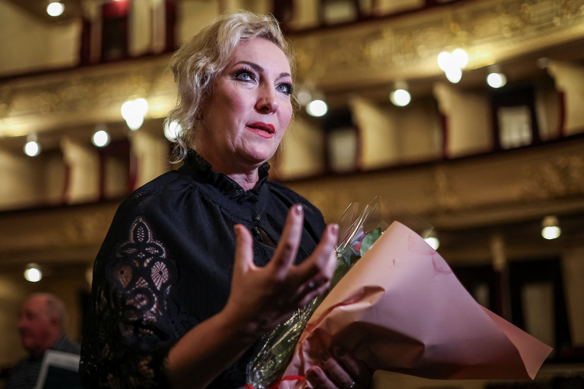 Anzhelina Shvachka, who performs the role of grandmother Olha, reacts following the premiere of the contemporary opera "Mothers of Kherson", which tells the story of Ukrainian mothers seeking to recover children abducted by Russia, co-commissioned by Metropolitan Opera in New York and the Polish National Opera in Warsaw, amid Russia’s attack on Ukraine, at the Taras Shevchenko National Opera and Ballet Theatre in Kyiv, Ukraine, June 4, 2026. REUTERS/Alina Smutko